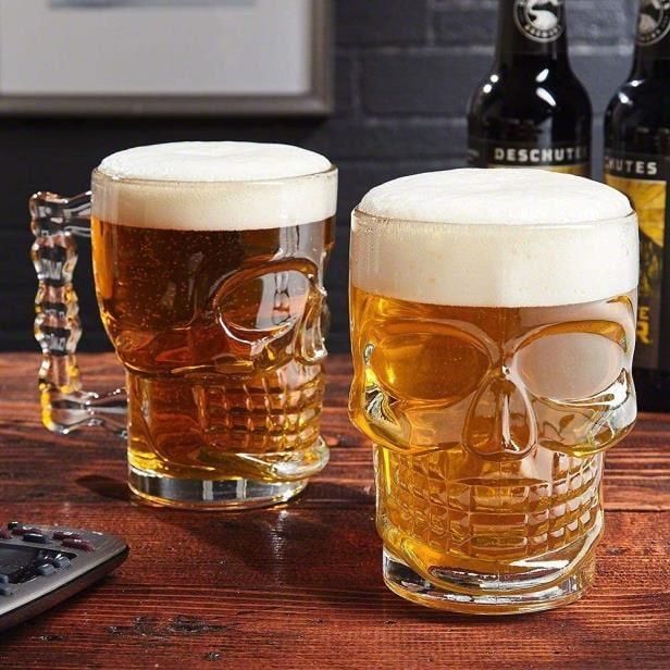 Elevate your drinking experience with our distinctive Skull Beer Glass. Perfectly balancing macabre charm with practical design, this glass makes every sip memorable. The skull shape provides an excellent grip while keeping your beer at the ideal temperature. Impress your friends at gatherings or treat yourself to a unique way to enjoy your favorite brews. Sturdy construction ensures this conversation piece will last through countless toasts.