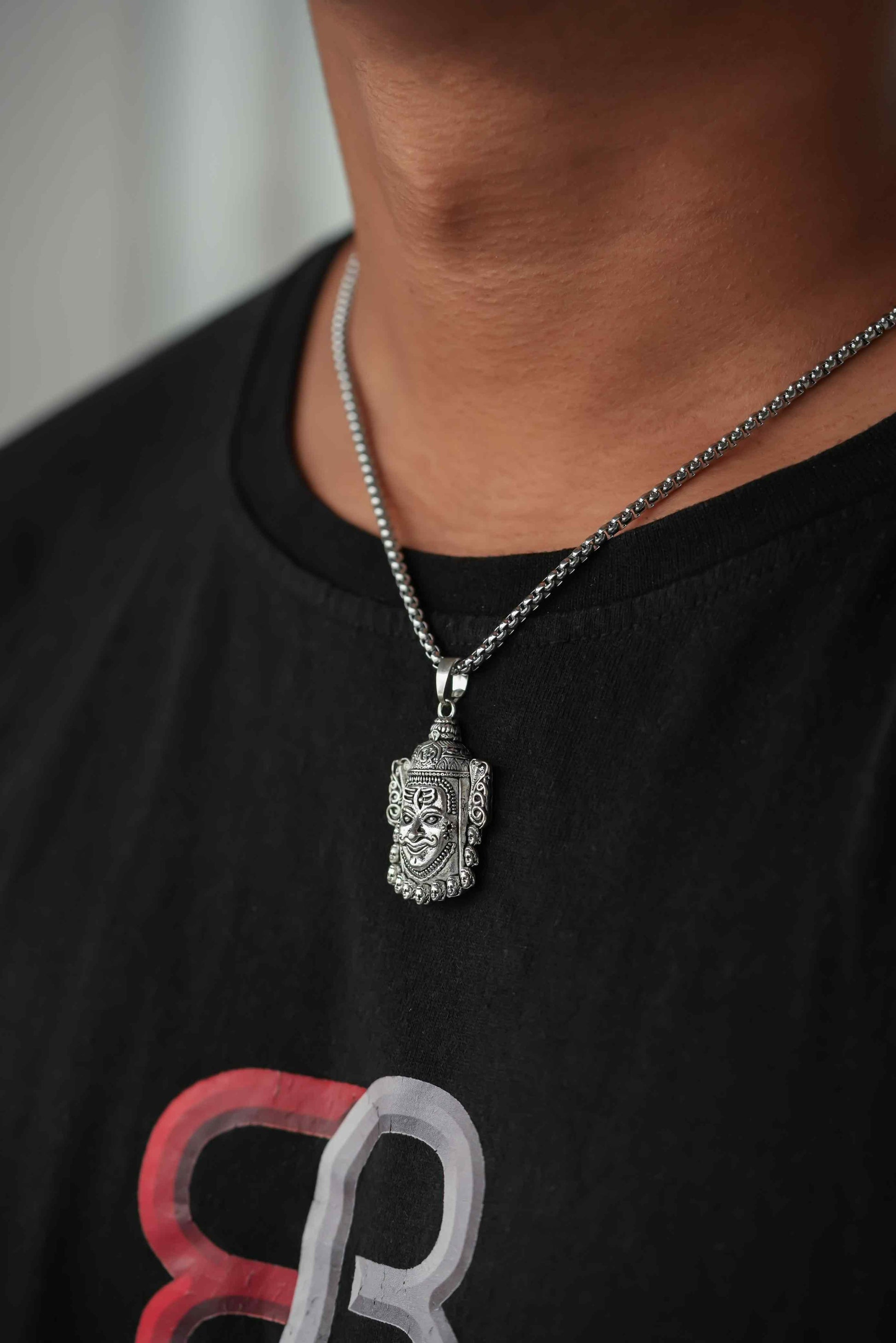 Silver Mahakal Pendant WIth Chain
Crafted with precision, this Silver Mahakal Pendant With Chain combines spiritual significance with elegant craftsmanship. The detailed Mahakal design showcases expert silverwork, making it both a meaningful religious symbol and a sophisticated accessory. Comes complete with a matching chain for immediate wear.
