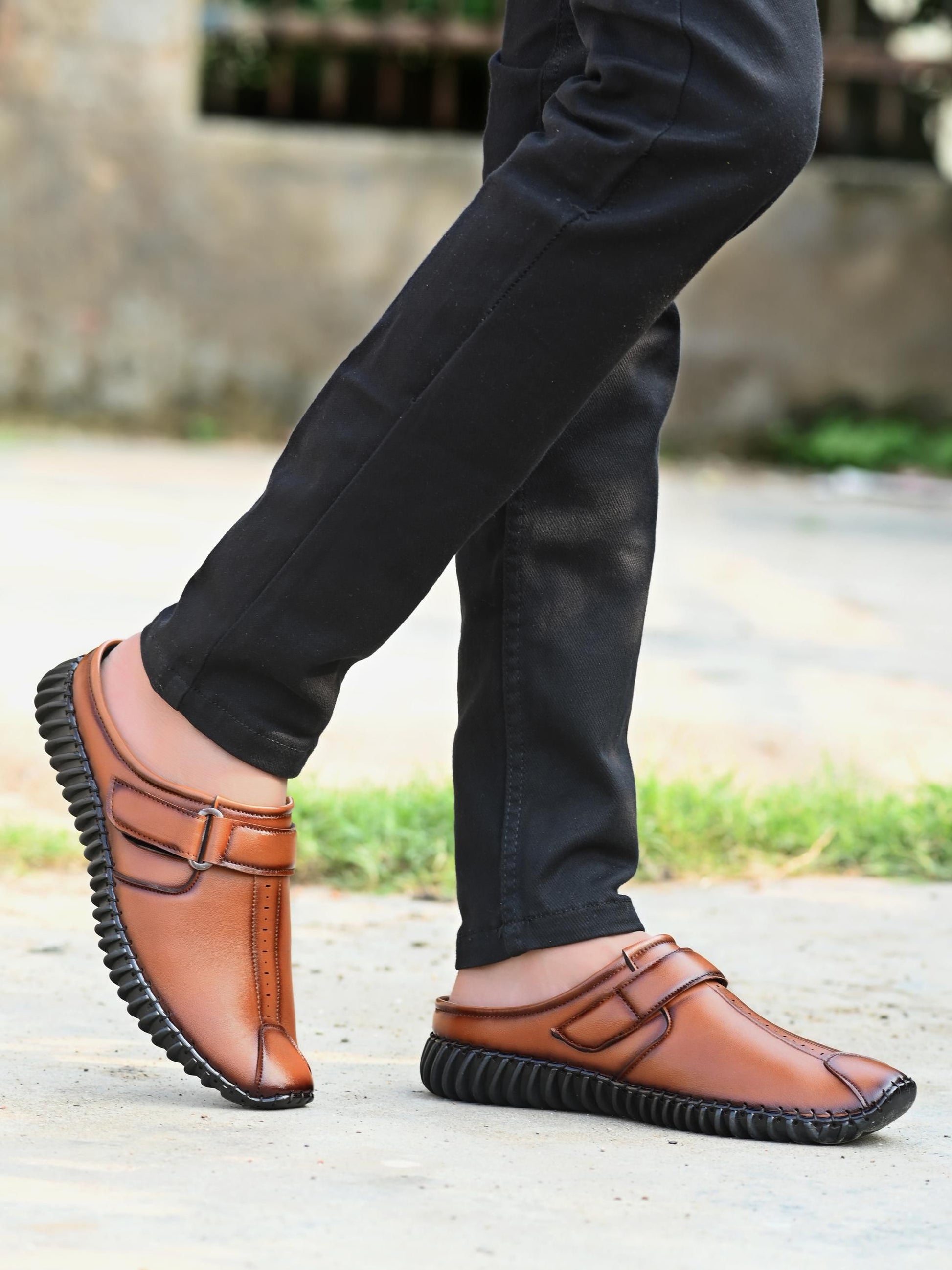 Effortlessly combine comfortable style and professional appeal with our Men's Bantu Style Tan Loafer Casual Shoe. With a classic loafer design and durable construction, these shoes offer the perfect balance of functionality and fashion. Perfect for any occasion, let these shoes elevate your wardrobe.