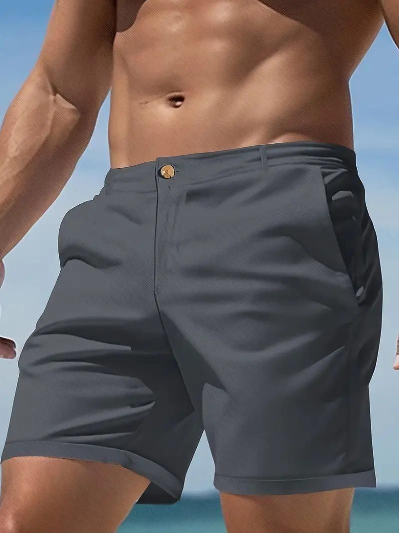 These Men's Sleek Solid Dark Grey Casual Shorts are a must-have for any stylish man. Made with high-quality fabric, they offer both comfort and durability. The sleek dark grey color is versatile and can easily be dressed up or down for any occasion. An essential addition to any wardrobe.