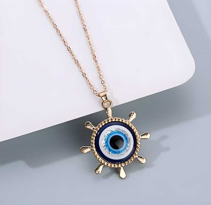 Elegantly crafted Western Silver Evil Eye Chain Necklace combines traditional symbolism with contemporary design. This sterling silver piece features a distinctive evil eye pendant known for its protective qualities. The delicate chain offers versatile styling options, making it suitable for both casual and formal occasions. A sophisticated accessory that complements any outfit while serving as a meaningful talisman.