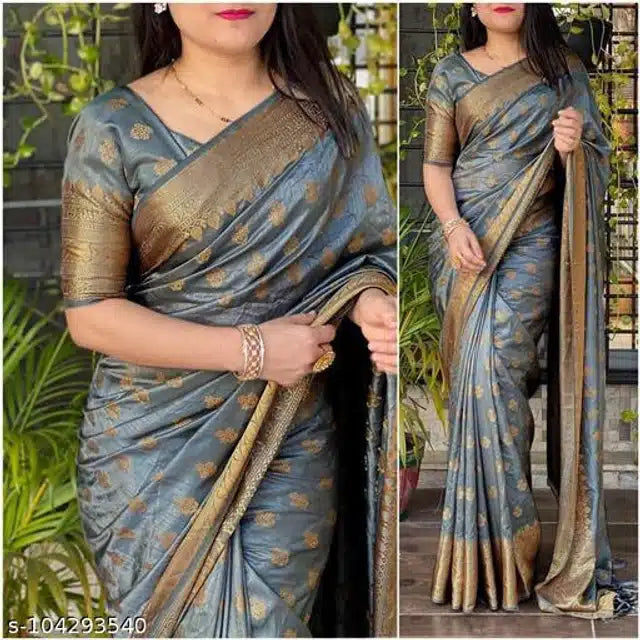 This Banarasi Silk Saree in a rich orange hue exemplifies traditional craftsmanship with its fine silk fabric and detailed weaving. Measuring 6.3 meters, it comes with a matching blouse piece for a tailored fit. Perfect for formal events and celebrations, the saree offers a luxurious texture and elegant fall, enhancing your presence with classic sophistication.