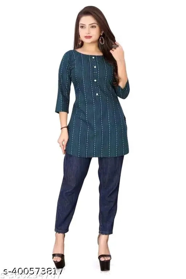 This navy blue short kurti for women is made from pure cotton, ensuring breathability and comfort throughout the day. Its solid color and minimalist design make it a versatile addition to any wardrobe, suitable for both casual outings and office wear. The size S offers a tailored fit that enhances the silhouette while allowing ease of movement. Perfect for those who appreciate quality fabric combined with understated elegance.