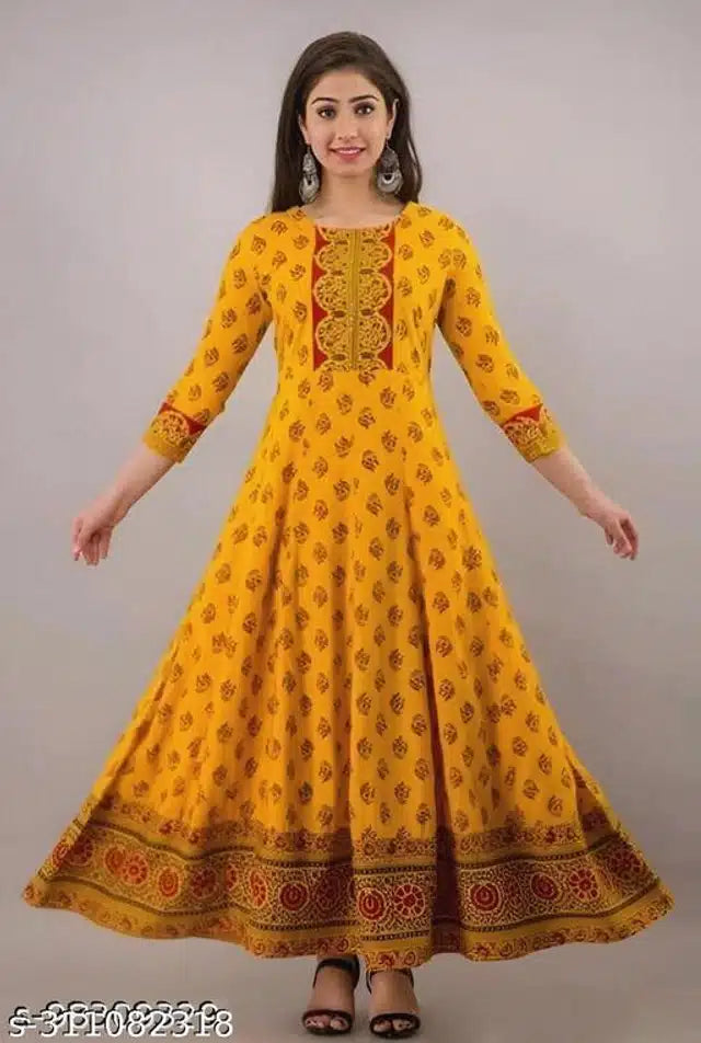 This orange Anarkali kurti, crafted from soft rayon, features an elegant printed design that enhances its traditional appeal. Its flowing silhouette offers a flattering fit while ensuring comfort and breathability, making it ideal for both everyday wear and special occasions. Available in size S, this kurti blends classic style with modern ease for a refined ethnic look.