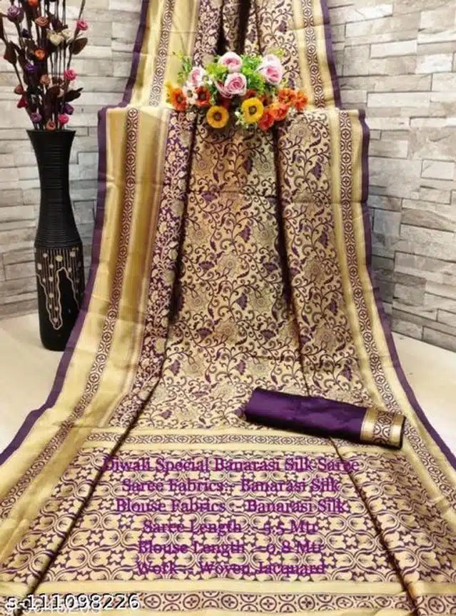 This Banarasi Silk Saree in golden and purple combines traditional craftsmanship with luxurious silk fabric. Measuring 6.3 meters, it includes a matching blouse, offering a complete outfit for formal occasions. The saree’s intricate weaving and rich colors highlight its heritage appeal, while the high-quality silk ensures a graceful drape and lasting comfort. Ideal for weddings and cultural events, it exemplifies expert artistry and timeless elegance.