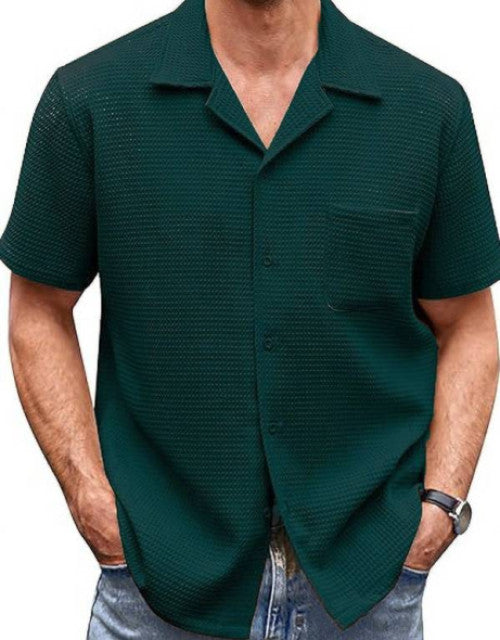 This Men's Checkered Casual Shirt boasts a relaxed fit and a spread collar, perfect for a comfortable and stylish look. Made with high-quality materials, it offers a versatile and durable addition to any wardrobe. Elevate your casual outfit game with this must-have shirt.