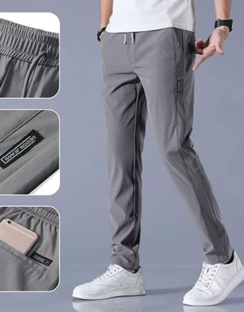 Stay comfortable and stylish during your workouts with our Men's Solid Breathable Gym Track Pant. Made with breathable fabric, these track pants allow for maximum airflow to keep you cool and dry. Perfect for the gym or casual wear, these pants provide both functionality and fashion.