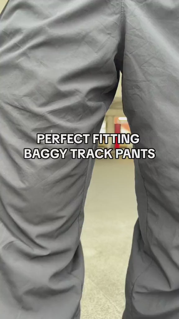 Stay comfortable and stylish with this pack of two Men's Oversized Sports Track Pant. Made with high-quality materials, these pants offer a loose and relaxed fit, perfect for any sports activity. Designed to keep you cool and dry, they are a must-have for any athlete or active individual.