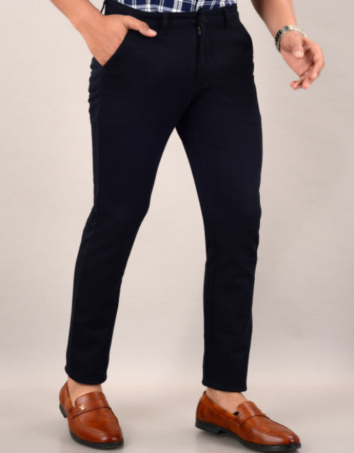 Introducing our Men's Slim Fit Casual Trouser in navy blue. Available in sizes 30, 32, 34, and 36, these trousers offer a sleek and modern fit for any occasion. Expertly crafted for a polished look, these trousers are the perfect addition to any wardrobe.