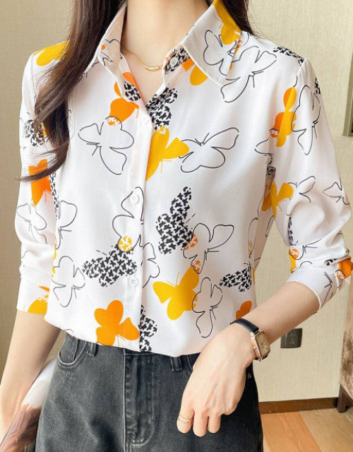 Expertly crafted women's casual shirt featuring a regular fit silhouette with tasteful printed patterns. The versatile design transitions effortlessly from day to evening wear, while quality fabric ensures comfort during extended wear. Perfect for pairing with jeans, trousers, or skirts for a polished yet relaxed appearance.