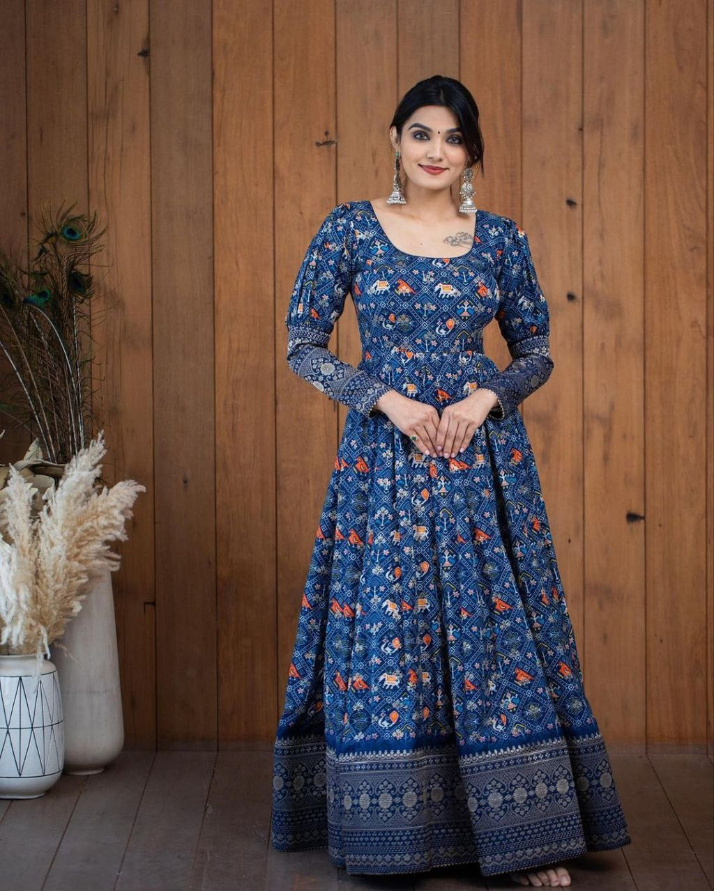 This stylish printed georgette gown combines elegance and trendiness, perfect for women attending parties, weddings, and festive occasions. Made from lightweight georgette fabric, it ensures comfort while maintaining a sophisticated look. The intricate print design adds a fashionable flair, making it an ideal choice for special functions where you want to make a lasting impression.
