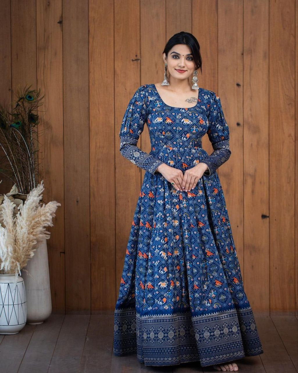 This stylish printed georgette gown combines elegance and trendiness, perfect for women attending parties, weddings, and festive occasions. Made from lightweight georgette fabric, it ensures comfort while maintaining a sophisticated look. The intricate print design adds a fashionable flair, making it an ideal choice for special functions where you want to make a lasting impression.
