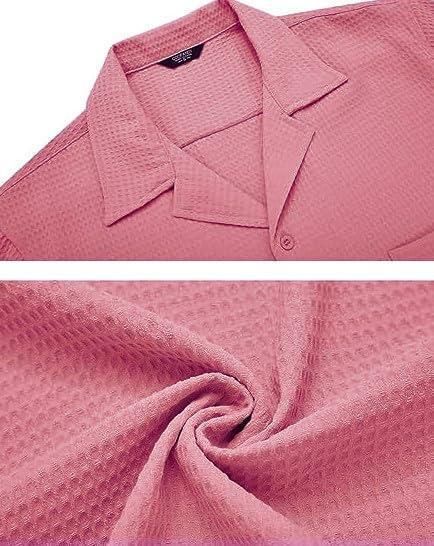 This Men's Knit Stylish Half Sleeve Shirt in pink is a stylish and versatile addition to any wardrobe. Made from high-quality knit fabric, it offers a comfortable and breathable fit. Featuring a classic half sleeve design, it is perfect for both casual and formal occasions. Stay stylish and comfortable with this must-have shirt.