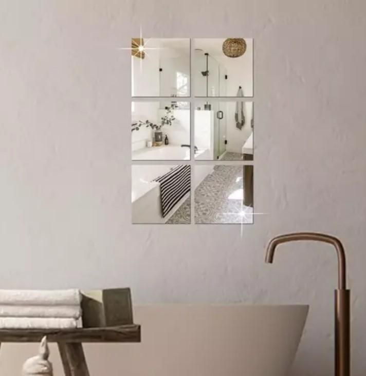 These 4 Big Square Silver 3D Acrylic Mirror Wall Stickers offer professional-grade interior enhancement. Crafted from premium acrylic with reflective silver finish, they create depth and dimension on any wall surface. The three-dimensional design maximizes light reflection, visually expanding your space while providing sophisticated decorative appeal. Ideal for contemporary interiors seeking architectural interest without permanent installation.