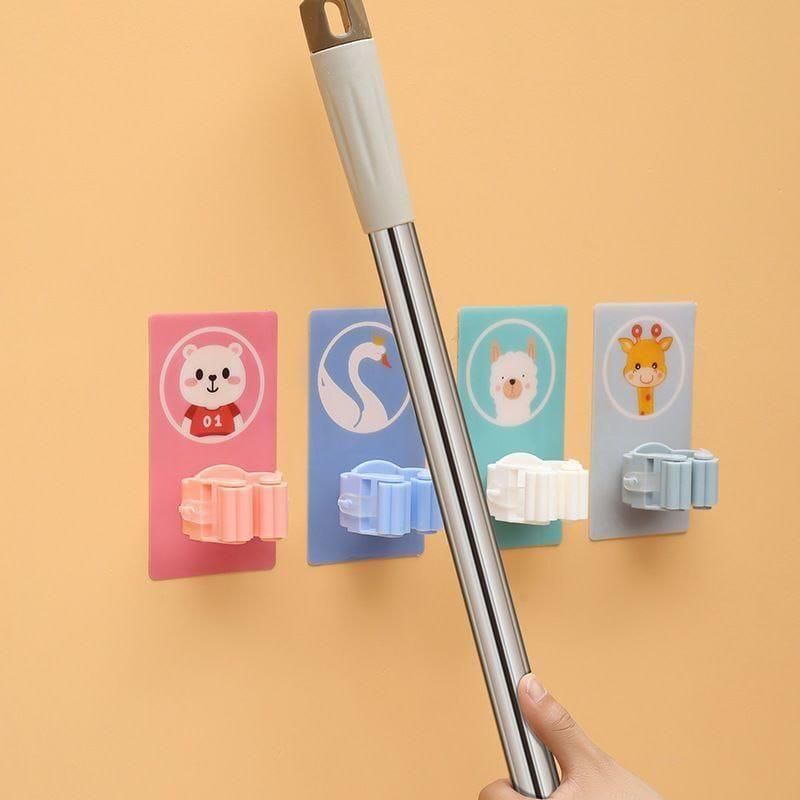 Keep your cleaning tools organized and easily accessible with this pack of 2 wall-mounted mop and broom holders. Designed with a playful cartoon style, these holders securely grip your mops and brooms, preventing clutter and saving floor space. Easy to install and durable, they provide a practical solution for maintaining a tidy and efficient cleaning area. Ideal for homes or workplaces seeking both functionality and a touch of fun in storage.