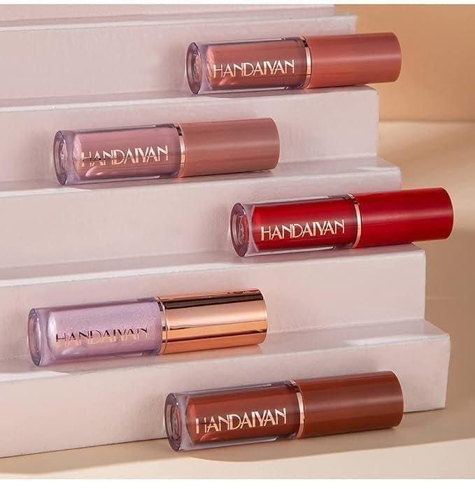 This professional-grade Velvet Matte Liquid Lipstick Set includes 12 distinct shades formulated with advanced color-lock technology. The non-drying velvet finish provides full coverage with remarkable longevity while maintaining lip comfort. Each precision applicator ensures flawless application, delivering rich pigmentation that sets to a true matte finish without settling into fine lines. Ideal for makeup artists and enthusiasts seeking comprehensive color options in one collection.