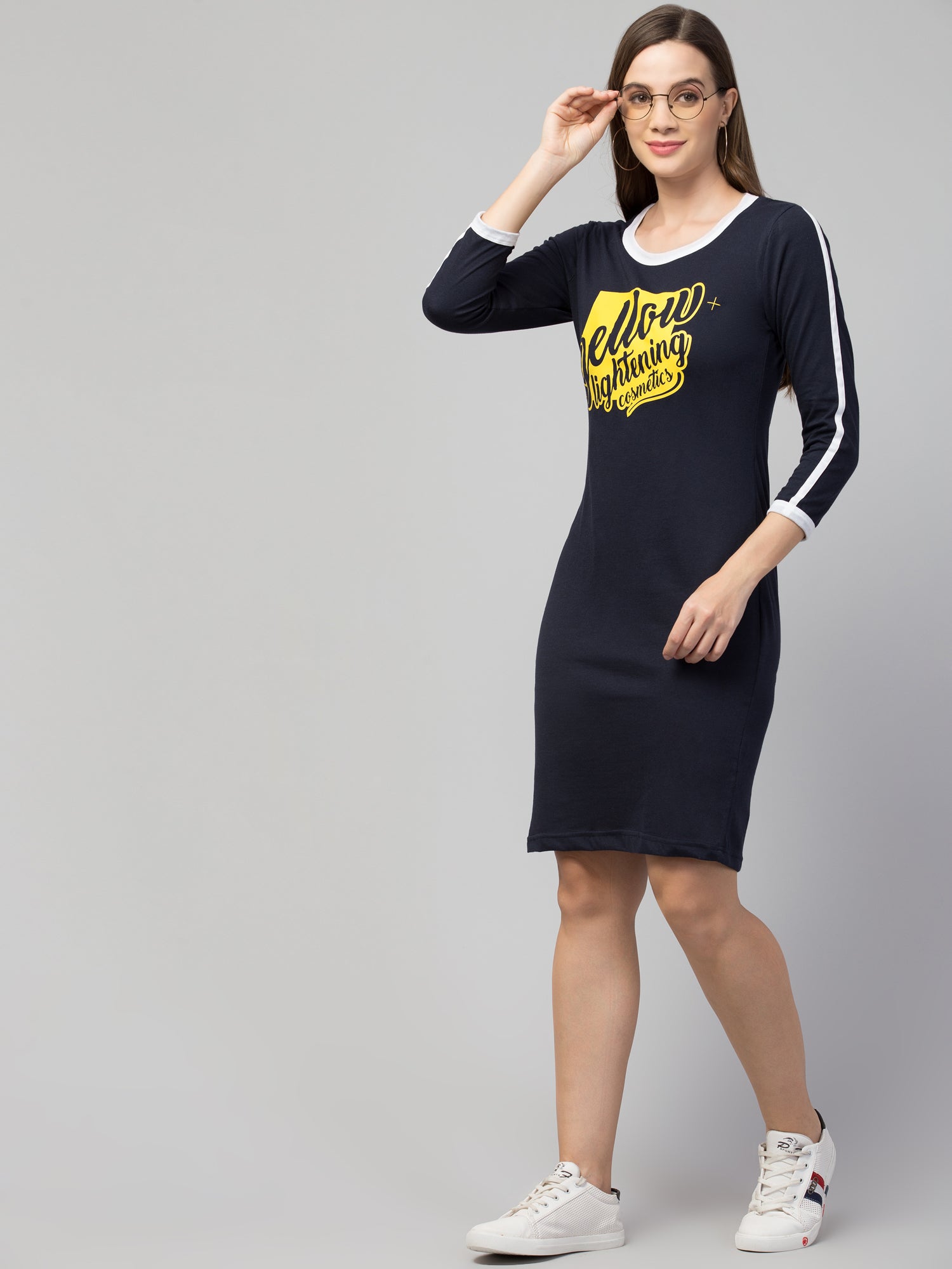 This versatile Cotton Graphic Print T-shirt Dress combines comfort with contemporary style. Crafted from breathable cotton fabric, it features eye-catching graphic prints that make a statement. The short length offers mobility while maintaining a flattering silhouette. Perfect for casual outings, this dress can be styled with sneakers for a relaxed look or dressed up with accessories for evening wear.