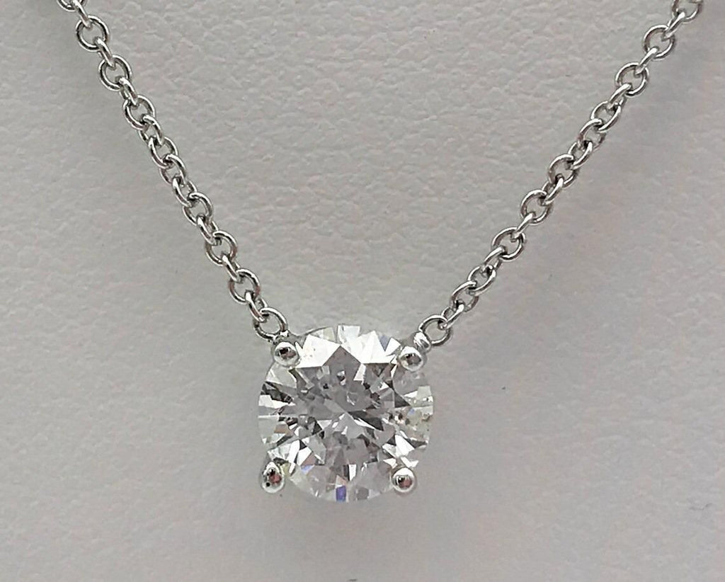 This elegant silver necklace features a specialized weight loss stone believed to support metabolism and energy balance. Crafted with precision, the pendant rests at an optimal position to maximize contact with energy centers. The durable silver chain ensures longevity while complementing any outfit, making it both a functional wellness accessory and a sophisticated jewelry piece.