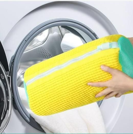 This specialized Shoe Washing Machine Bag provides essential protection for footwear during machine washing. Engineered with high-density mesh construction, it facilitates optimal water flow and detergent penetration while preventing potential damage to both shoes and washing machine components. The reinforced zipper mechanism ensures secure containment throughout the wash cycle, maintaining shoe structure and integrity. Compatible with all standard washing machines and suitable for various footwear types i