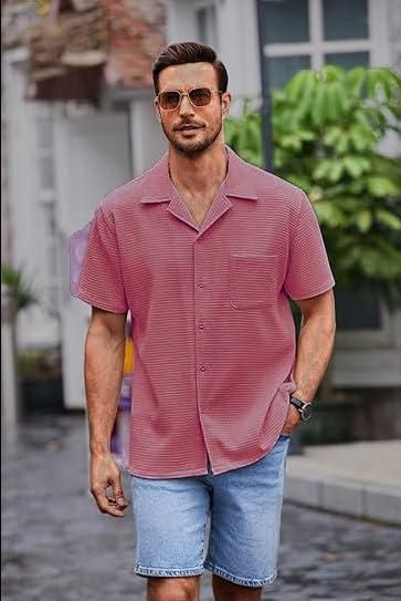 This Men's Knit Stylish Half Sleeve Shirt in pink is a stylish and versatile addition to any wardrobe. Made from high-quality knit fabric, it offers a comfortable and breathable fit. Featuring a classic half sleeve design, it is perfect for both casual and formal occasions. Stay stylish and comfortable with this must-have shirt.