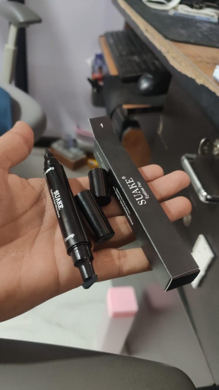 Our Eye Liner and Eye Wing Stamp delivers professional-quality results with clinical precision. The dual-ended design features a highly-pigmented liquid liner and an ergonomically engineered wing stamp that creates perfectly symmetrical wings in seconds. The ophthalmologist-tested formula contains long-chain polymers for 24-hour wear resistance while remaining gentle on the delicate eye area. Suitable for all skill levels, this tool eliminates the technical challenges of traditional winged liner application