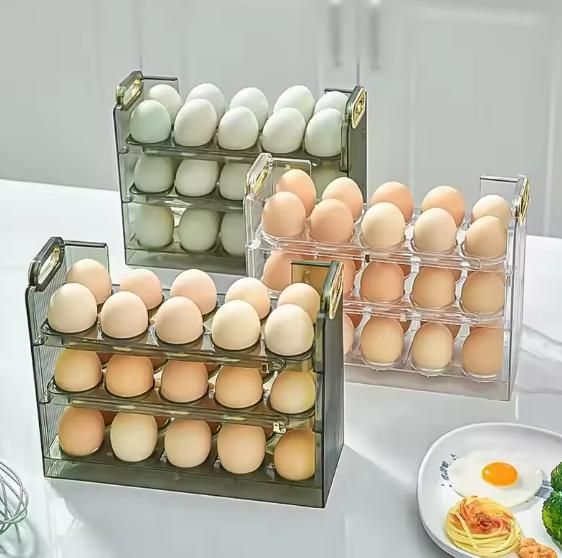 Keep your kitchen organized with our practical 3 Layer Egg Stand. This space-saving solution holds multiple eggs in a compact, tiered design that fits neatly on countertops or inside refrigerators. We've crafted it for stability and easy access, making meal preparation smoother while helping preserve your eggs' freshness. An essential addition to any well-ordered kitchen.