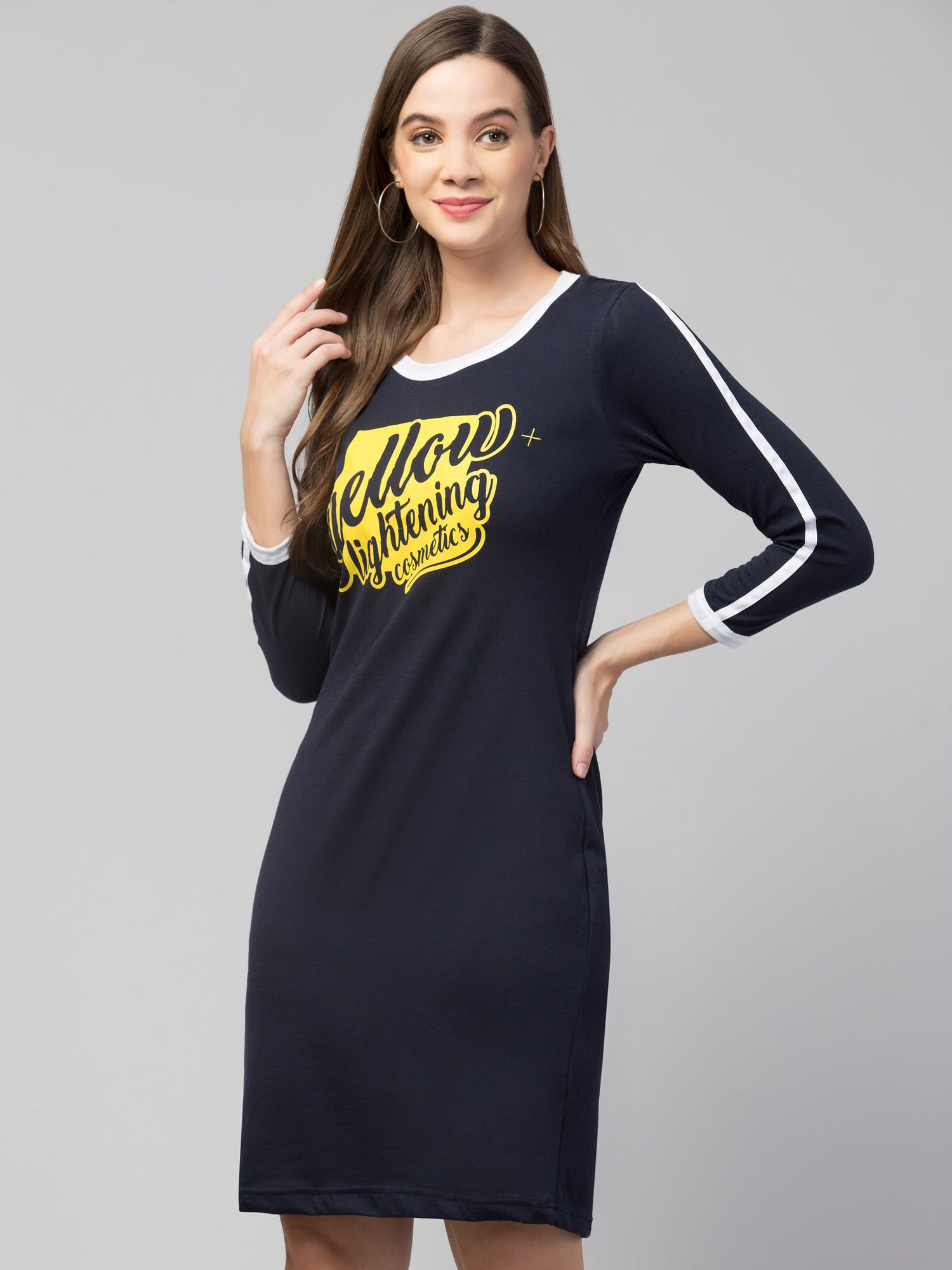 This versatile Cotton Graphic Print T-shirt Dress combines comfort with contemporary style. Crafted from breathable cotton fabric, it features eye-catching graphic prints that make a statement. The short length offers mobility while maintaining a flattering silhouette. Perfect for casual outings, this dress can be styled with sneakers for a relaxed look or dressed up with accessories for evening wear.