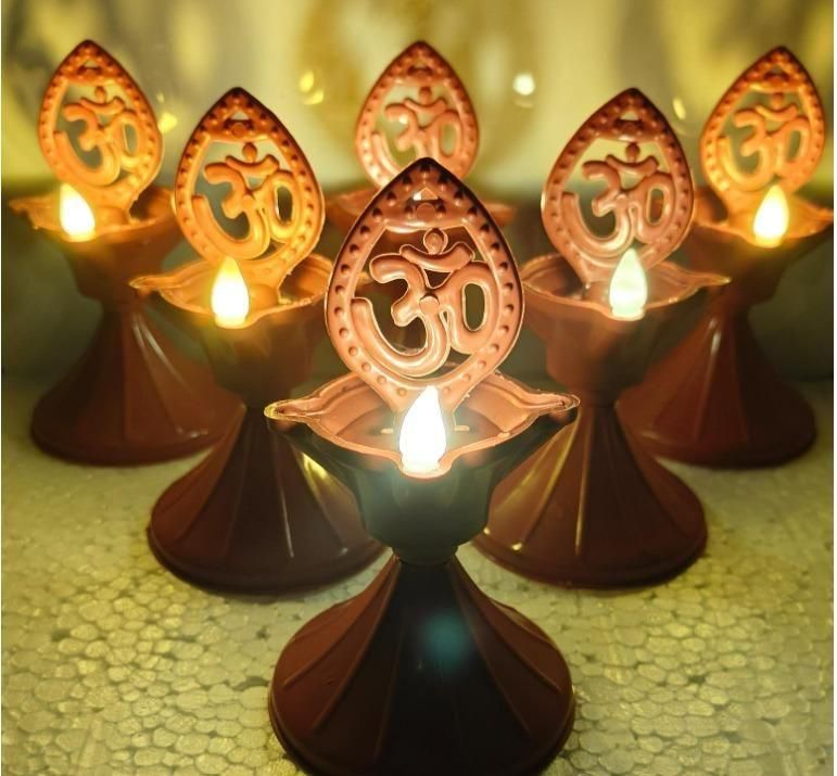 These waterproof Deep Water LED Diyas combine traditional aesthetics with modern technology, offering a safe alternative to conventional oil lamps. Each pack contains three meticulously crafted diyas that produce a realistic flickering effect while being fully submersible in water. Ideal for religious ceremonies, festivals like Diwali, or home décor, these energy-efficient lights provide extended illumination without maintenance concerns. 