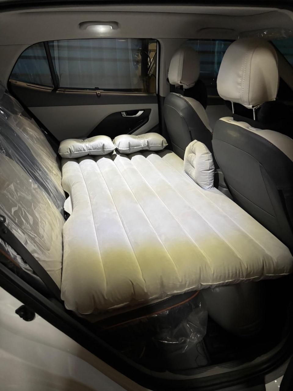 Experience enhanced comfort on the road with the Car Travel Bed Mattress featuring two inflatable air pillows. Designed to seamlessly fit most car backseats, this mattress provides a stable and cushioned surface for restful sleep during travel. Made from durable, waterproof materials, it ensures longevity and easy maintenance. The included air pillows offer additional support for your head and neck, reducing fatigue on long journeys. Ideal for road trips, camping, or emergency rest stops, this travel mattre
