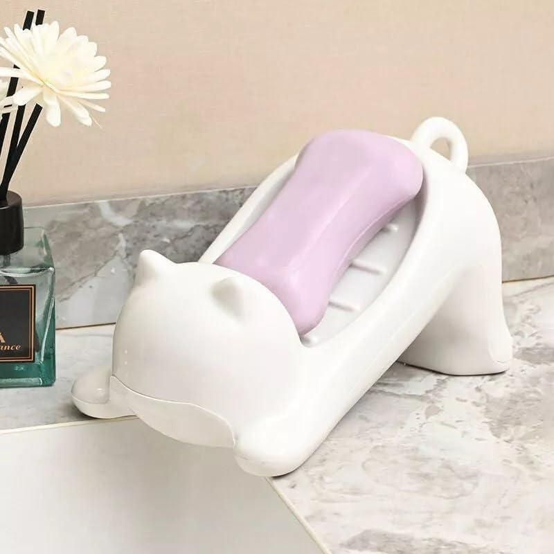 This Cat Shape Soap Holder combines functionality with feline-inspired design. Featuring strategic drainage holes to prevent water accumulation, it extends soap longevity by keeping it dry between uses. The elevated platform promotes airflow, reducing soap waste while adding a distinctive decorative element to your bathroom or kitchen space. Crafted from durable materials for long-term use in humid environments.