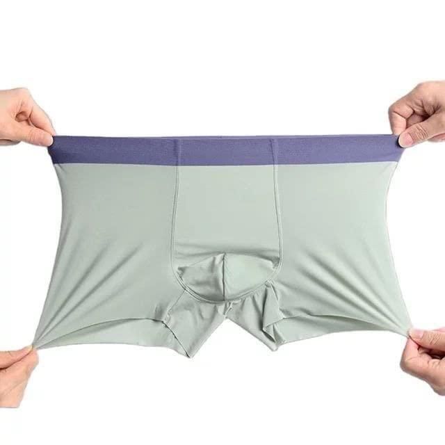 Introducing our Men's Ice Silk Briefs Boxers, designed for ultimate comfort and breathability. Made with premium ice silk material, these boxers provide a smooth and cooling sensation, perfect for everyday wear. Available in a pack of 5, these boxers offer superior value and style. Experience the luxury of ice silk today.