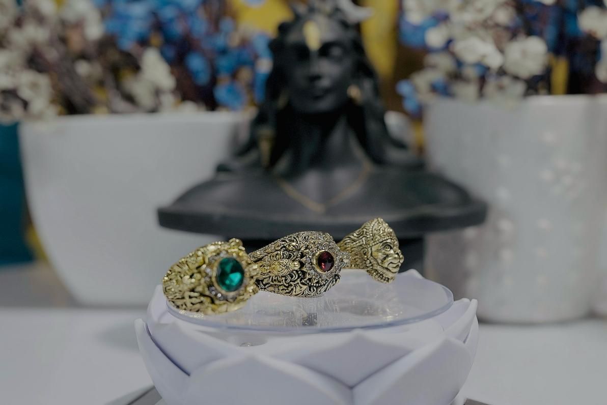 Religious Ring of Shivji Ganeshji & Hanumanji Combo of 3

Elevate your spiritual connection with our Religious Ring Combo featuring Shivji, Ganeshji, and Hanumanji. This set of three meticulously crafted rings serves as both devotional symbols and elegant accessories. Each deity's distinctive representation offers protection and blessings while complementing traditional and contemporary attire. Perfect for daily wear or special religious occasions.