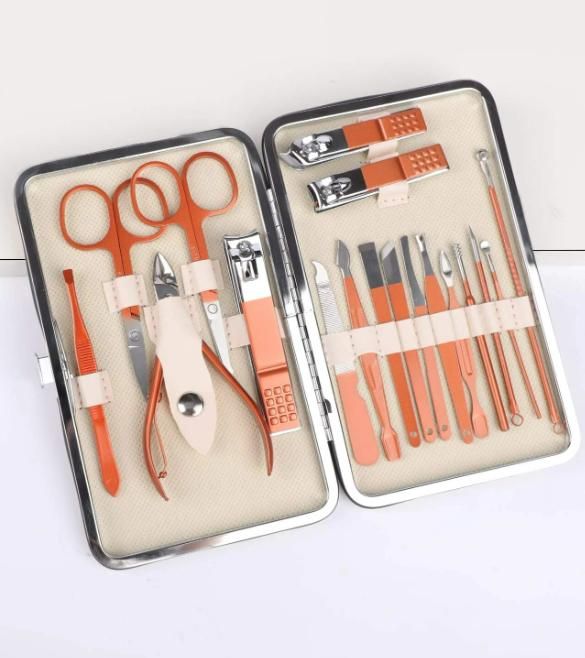 Professional-grade Manicure/Pedicure Nail Tool Set featuring precision-engineered stainless steel instruments for comprehensive nail maintenance. Each specialized tool addresses specific aspects of nail care, from cuticle management to precise shaping and buffing. The surgical-grade materials ensure optimal hygiene standards while providing exceptional durability and performance for both professional technicians and discerning home users.