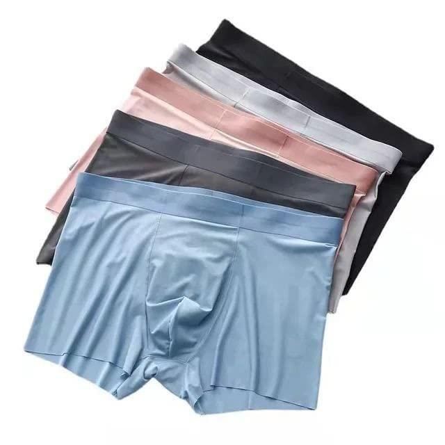 Introducing our Men's Ice Silk Briefs Boxers, designed for ultimate comfort and breathability. Made with premium ice silk material, these boxers provide a smooth and cooling sensation, perfect for everyday wear. Available in a pack of 5, these boxers offer superior value and style. Experience the luxury of ice silk today.