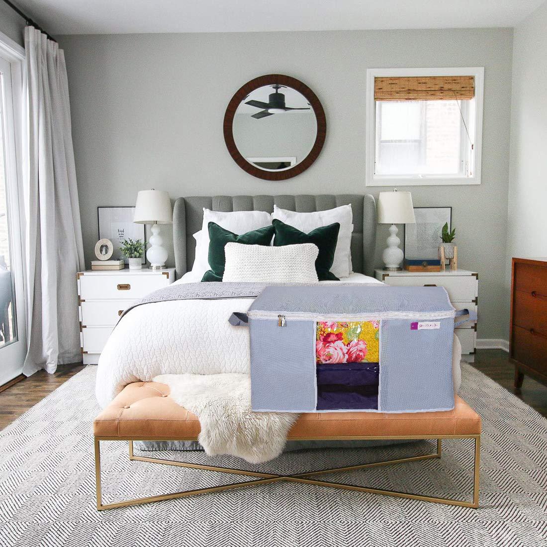 Maximize your storage space with these professional-grade underbed blanket storage bags. This set of 2 features reinforced handles for convenient access and transportation. Designed to utilize the often-wasted space beneath beds, these protective covers shield blankets and bedding from dust, moisture, and insects. The low-profile construction ensures optimal use of underbed clearance while maintaining the integrity of stored items.