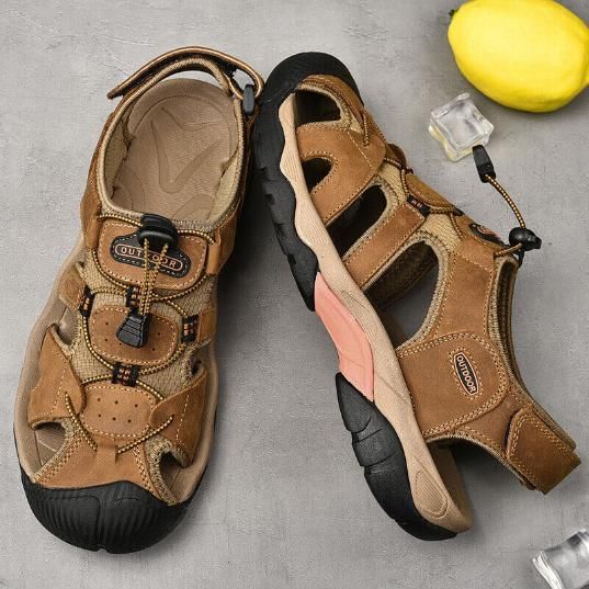 These men's leather closed toe sandals provide durable comfort with a sleek design. Made with high-quality leather, they offer superior protection against the elements and feature a closed toe for added safety. Perfect for both casual and outdoor activities.