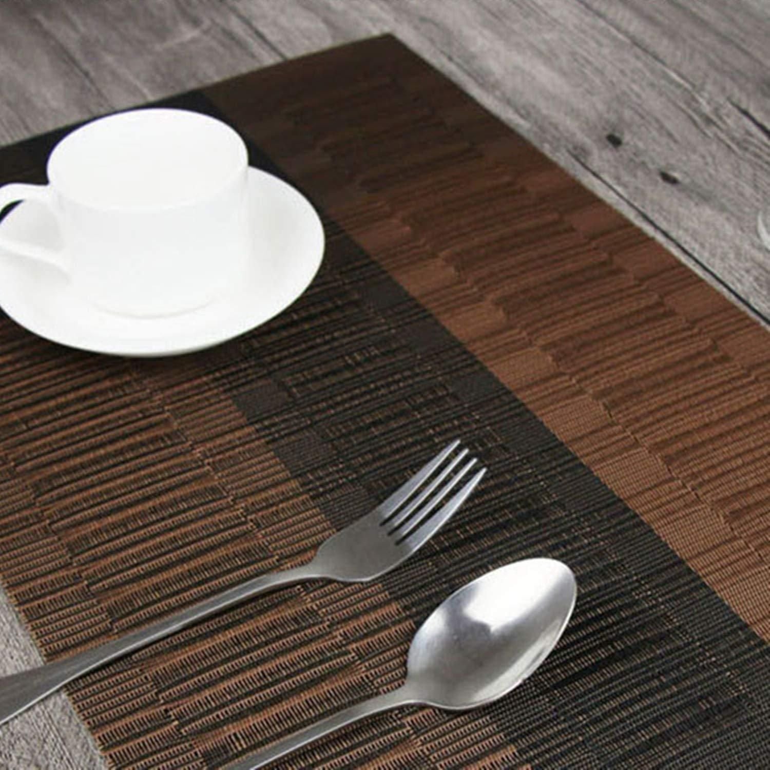 Designed with precision, our Table Mat Brown & Black (Pack of 4) offers superior table protection against heat, scratches, and spills. The dual-tone color scheme complements diverse interior aesthetics while the premium construction ensures longevity. These mats feature non-slip backing for stability and are easily cleanable, making them an essential addition to both casual family meals and formal dining occasions.