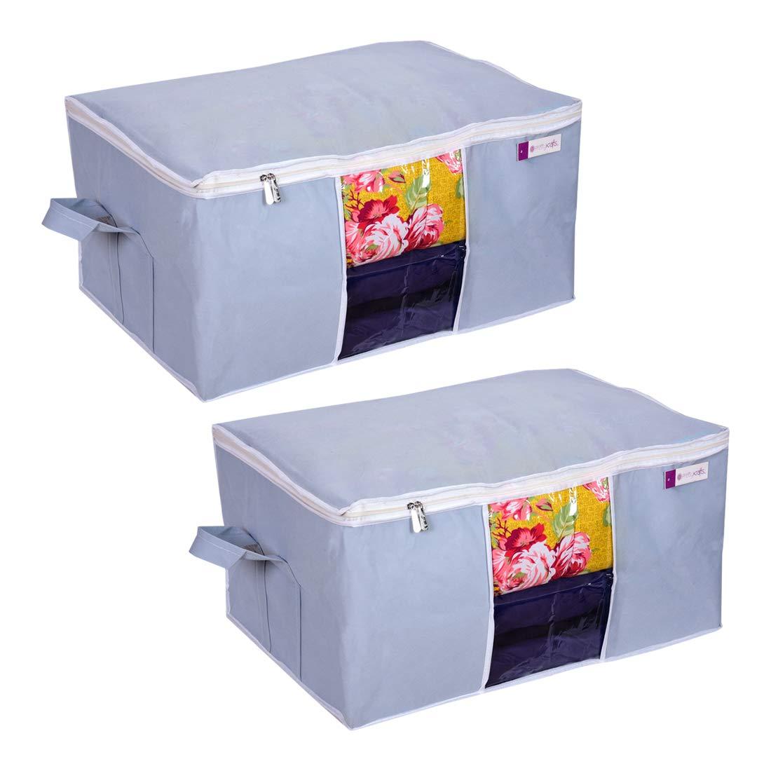 Maximize your storage space with these professional-grade underbed blanket storage bags. This set of 2 features reinforced handles for convenient access and transportation. Designed to utilize the often-wasted space beneath beds, these protective covers shield blankets and bedding from dust, moisture, and insects. The low-profile construction ensures optimal use of underbed clearance while maintaining the integrity of stored items.