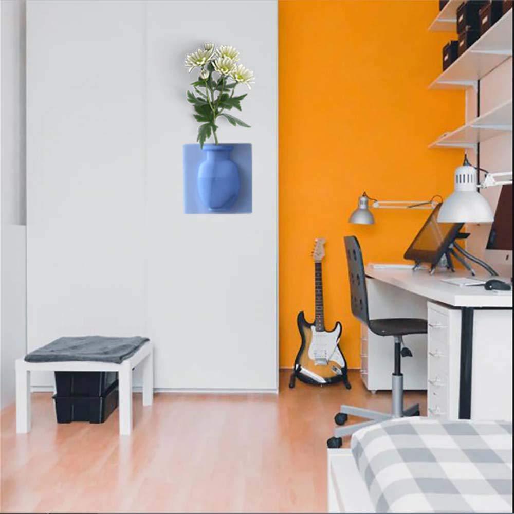 This wall-mounted silicone vase offers a versatile and modern solution for displaying flowers or small plants. Crafted from flexible, durable silicone, it adheres securely to smooth surfaces without the need for drilling or hardware. Its removable design allows easy repositioning and cleaning, making it ideal for enhancing any room with minimal effort. Perfect for adding a touch of greenery in compact spaces, this sticky vase combines functionality with sleek aesthetics for expert-level home decor.