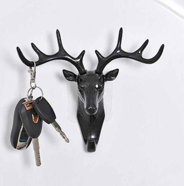 The Self Adhesive Deer Head Hanging Hook combines elegant design with practical functionality. Easy to install without drilling, this hook adheres securely to smooth surfaces, providing a reliable spot to hang keys, light bags, or decorative items. Its unique deer head shape adds a refined touch to any room, making it both a stylish and efficient organizational accessory. Ideal for enhancing your home or office space with minimal effort.
