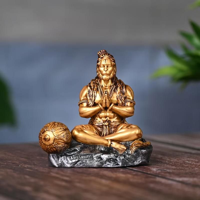 This exquisitely detailed Mahabali Lord Hanuman Ji Statue represents the epitome of devotion and strength in Hindu iconography. Sculpted with precision to capture the divine essence of the Vanara god, it features traditional attributes including his powerful stance and benevolent expression. An authentic devotional piece that serves as both a spiritual focal point and an artistic masterpiece for worship spaces.
