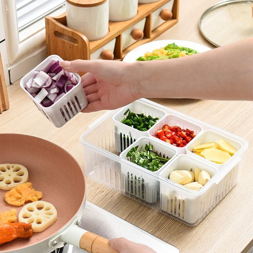 Optimize your fridge organization with the 6 Grid Fridge Storage Boxes Containers. Featuring six separate compartments, these containers allow for systematic storage of different food items, preventing cross-contamination and preserving freshness. Crafted from durable, food-safe materials, they offer reliable protection and easy visibility for quick access. Perfect for maintaining an orderly kitchen, these containers enhance food management and reduce waste.