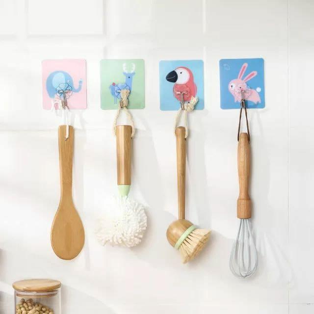 These Hooks-Cartoons Strong Adhesive Wall Sticky Hooks come in a pack of four, designed for reliable and damage-free mounting. Their strong adhesive backing ensures secure attachment to various surfaces, making them ideal for organizing and decorating your space efficiently. Easy to install and remove, these hooks provide a practical solution for hanging lightweight items without drilling or tools. Perfect for both home and office use, they combine functionality with a playful cartoon design to add a touch 