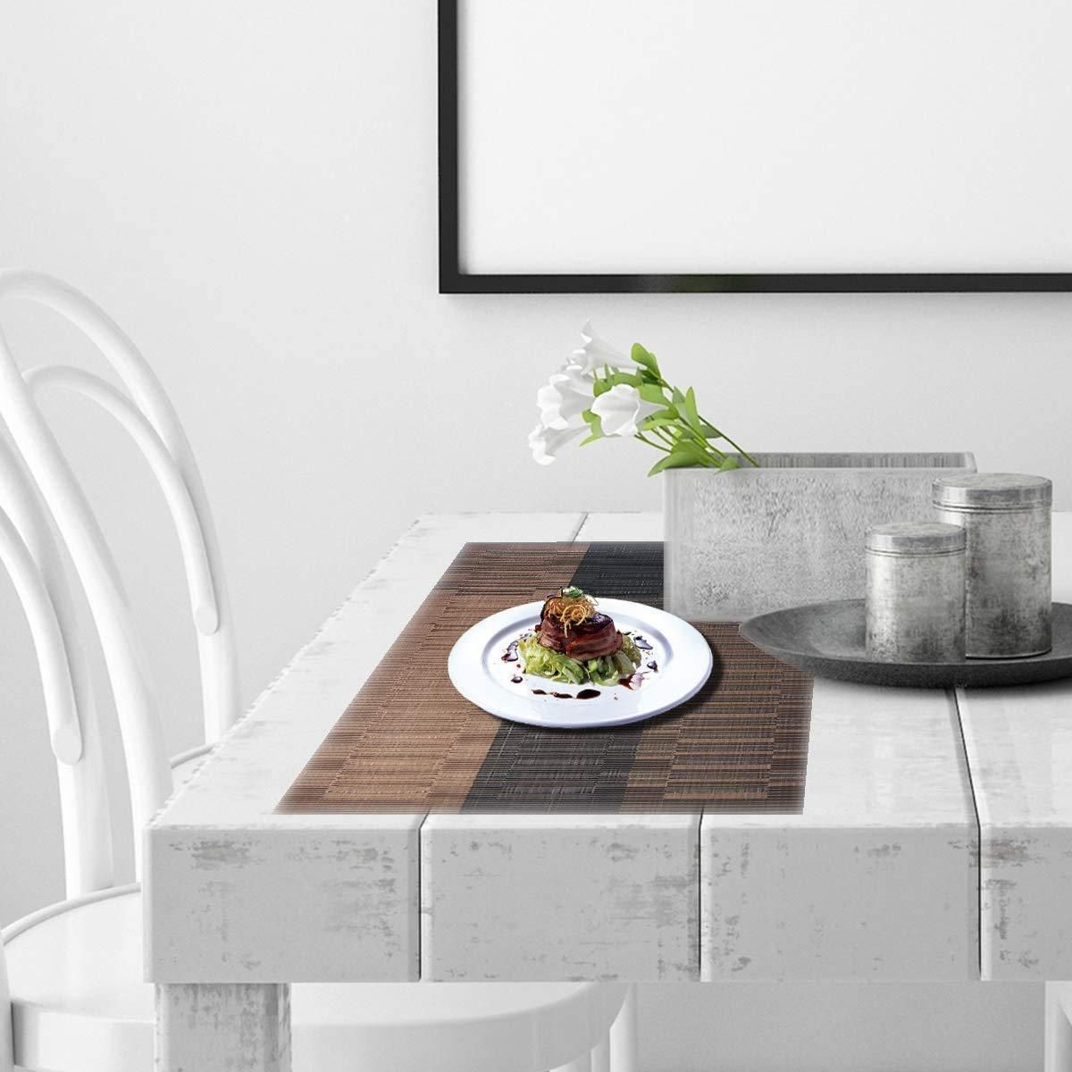 Designed with precision, our Table Mat Brown & Black (Pack of 4) offers superior table protection against heat, scratches, and spills. The dual-tone color scheme complements diverse interior aesthetics while the premium construction ensures longevity. These mats feature non-slip backing for stability and are easily cleanable, making them an essential addition to both casual family meals and formal dining occasions.