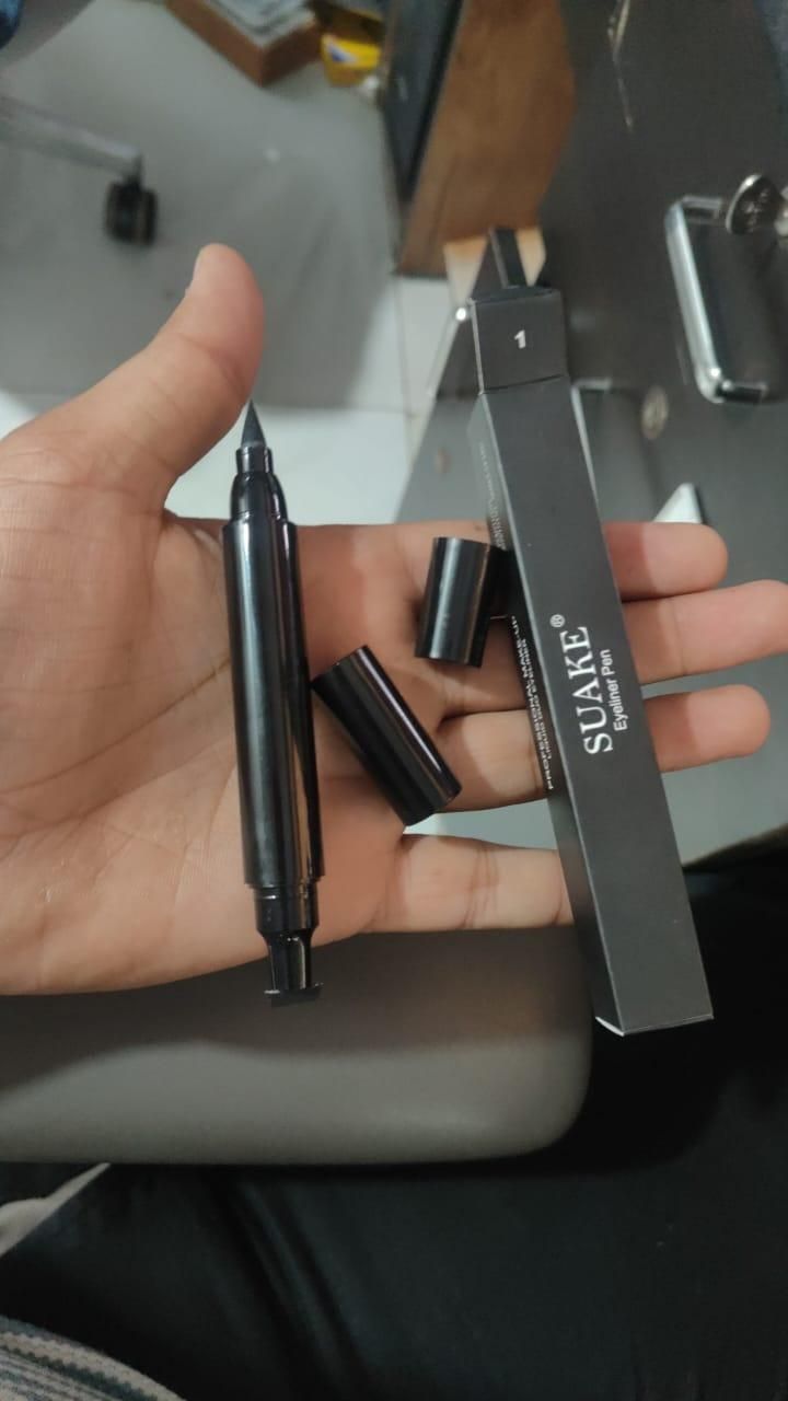 Our Eye Liner and Eye Wing Stamp delivers professional-quality results with clinical precision. The dual-ended design features a highly-pigmented liquid liner and an ergonomically engineered wing stamp that creates perfectly symmetrical wings in seconds. The ophthalmologist-tested formula contains long-chain polymers for 24-hour wear resistance while remaining gentle on the delicate eye area. Suitable for all skill levels, this tool eliminates the technical challenges of traditional winged liner application