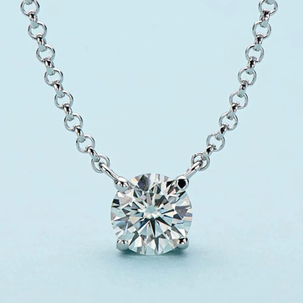 This elegant silver necklace features a specialized weight loss stone believed to support metabolism and energy balance. Crafted with precision, the pendant rests at an optimal position to maximize contact with energy centers. The durable silver chain ensures longevity while complementing any outfit, making it both a functional wellness accessory and a sophisticated jewelry piece.