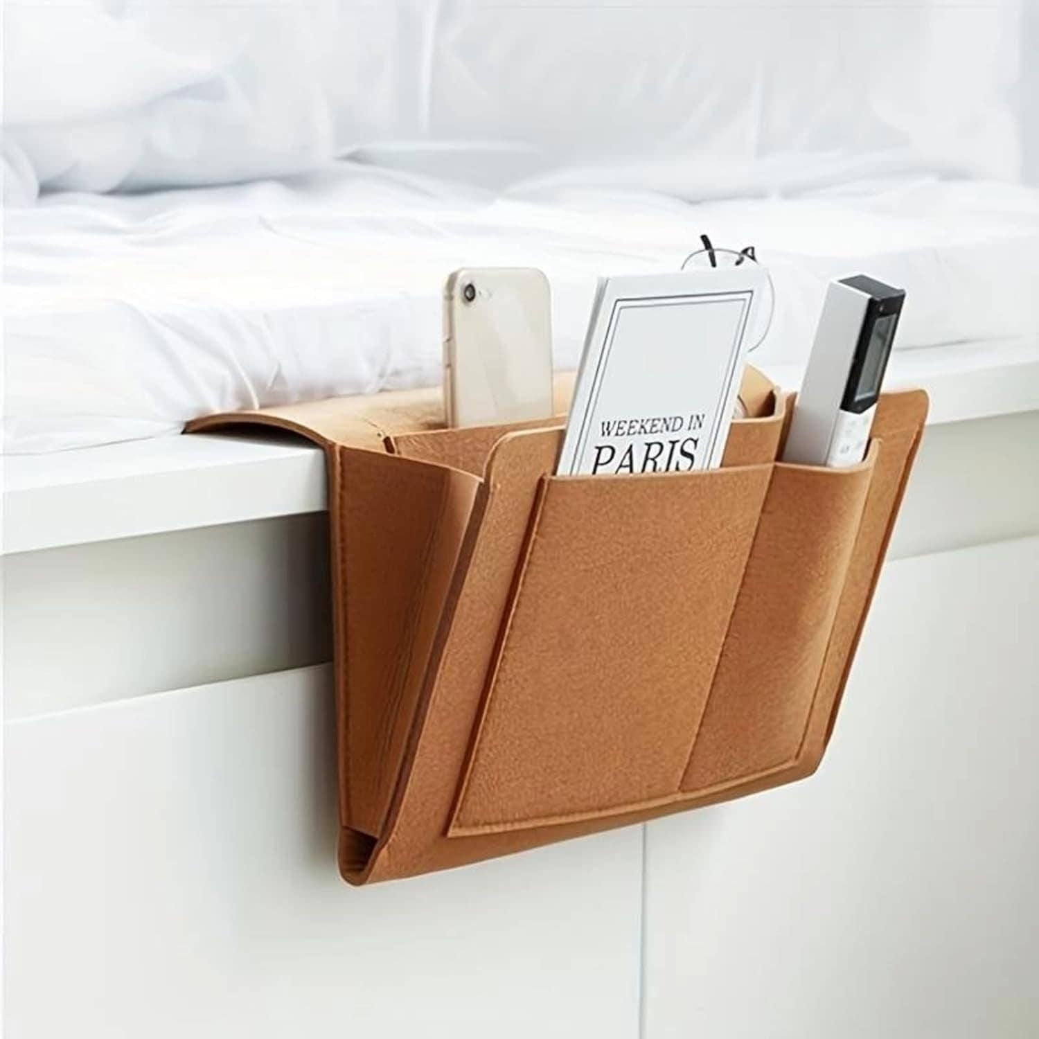 Our Bedside Storage Organizer provides the perfect solution for keeping your nighttime essentials organized and accessible. Designed to fit conveniently beside your bed, this practical organizer holds books, devices, glasses, and more—eliminating clutter and midnight searching. The durable construction and thoughtful design ensure everything you need stays right where you want it, supporting a more peaceful bedroom environment.
