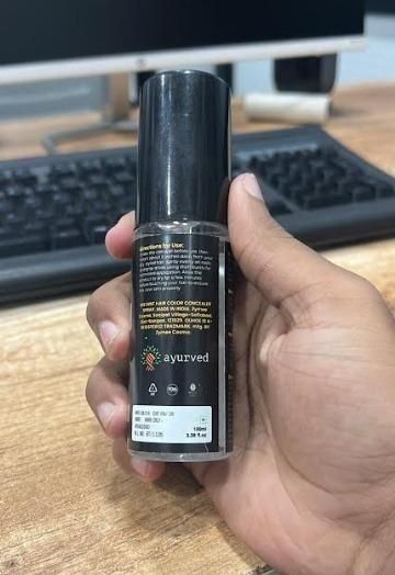 Engineered with advanced German technology, the Ayurved 2-in-1 Instant Hair Color Spray combines traditional Ayurvedic principles with modern color science. This dual-action formula provides immediate gray coverage while nourishing hair follicles. The convenient pack of two ensures extended use, delivering professional-quality results without ammonia or harsh chemicals. Ideal for maintaining color between treatments with minimal application time.
