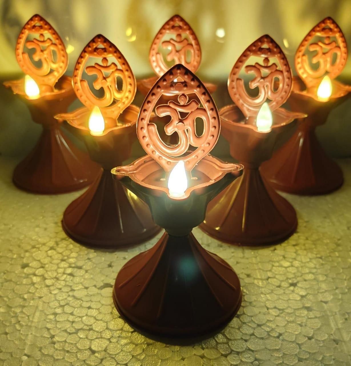 These waterproof Deep Water LED Diyas combine traditional aesthetics with modern technology, offering a safe alternative to conventional oil lamps. Each pack contains three meticulously crafted diyas that produce a realistic flickering effect while being fully submersible in water. Ideal for religious ceremonies, festivals like Diwali, or home décor, these energy-efficient lights provide extended illumination without maintenance concerns.