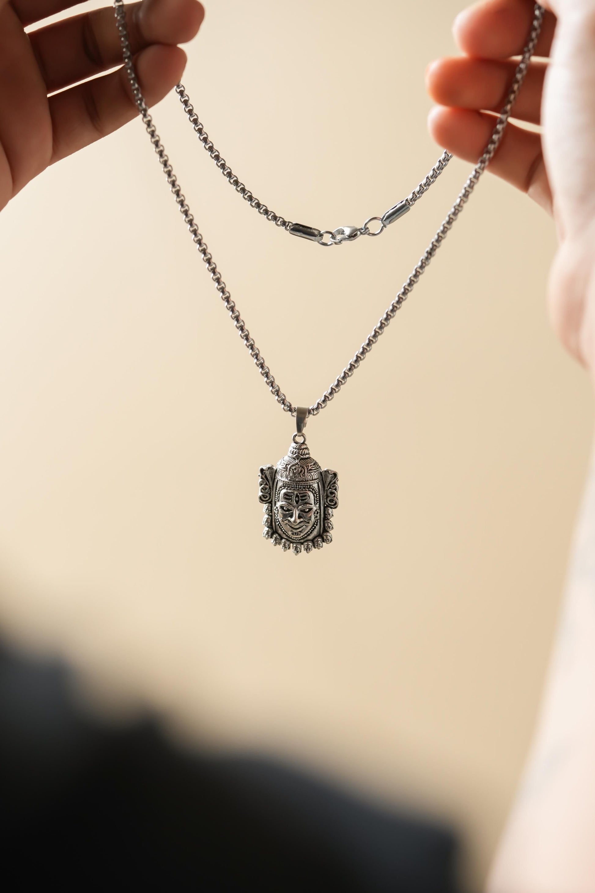 Silver Mahakal Pendant WIth Chain

Crafted with precision, this Silver Mahakal Pendant With Chain combines spiritual significance with elegant craftsmanship. The detailed Mahakal design showcases expert silverwork, making it both a meaningful religious symbol and a sophisticated accessory. Comes complete with a matching chain for immediate wear.